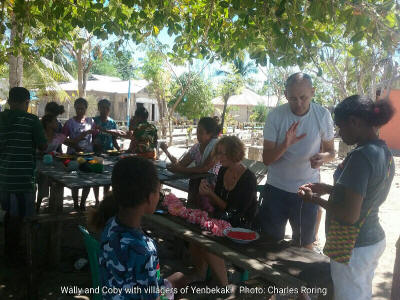 Wally and Coby with villagers from Yenbekaki